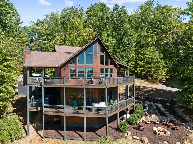 The lodge from above on a summer day, surrounded by trees