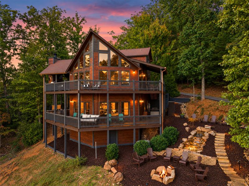 Aska Overlook from above at dusk, with its decks, the fire pit and the waterfall