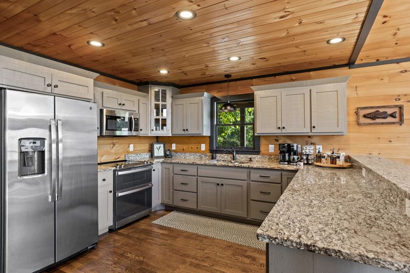 Stainless appliances and granite counters in the kitchen