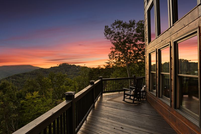 The main deck and a rocking chair at sunset