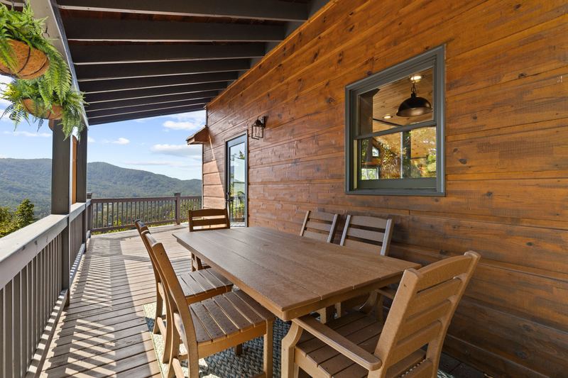 The outdoor dining table on the deck
