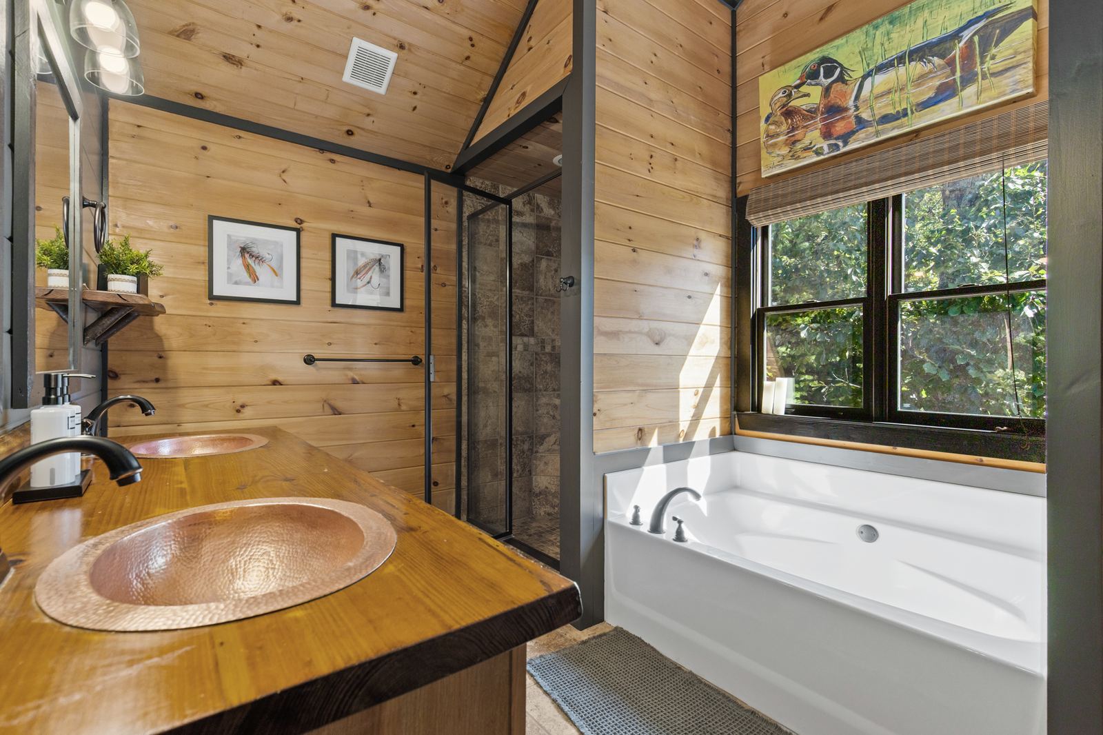 The primary bath's copper sink and soaking tub