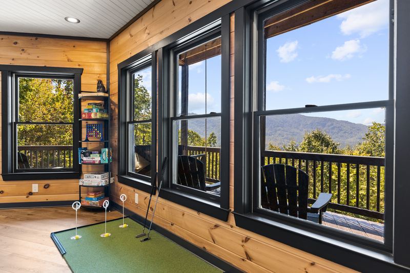 The BirdieBall putting green by the lower-level windows
