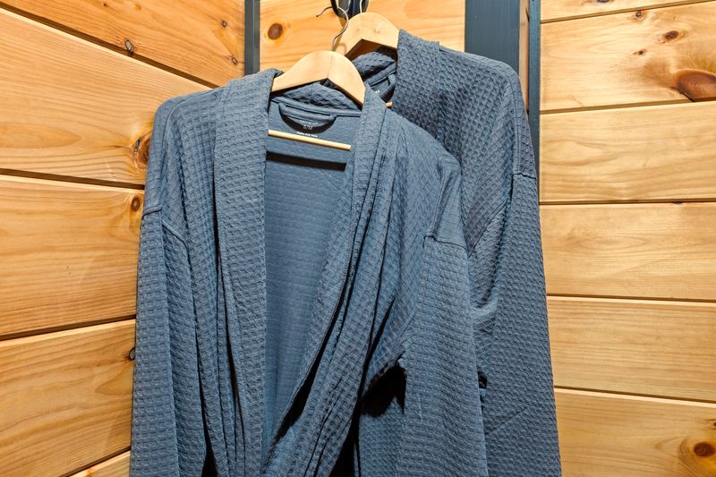 Robes hanging in the primary suite