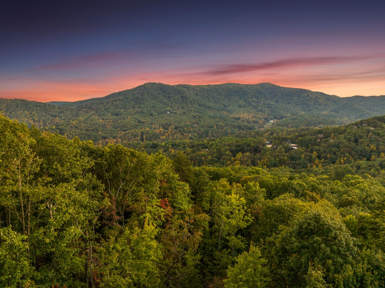 Sunset over the ridgelines beyond the cabin